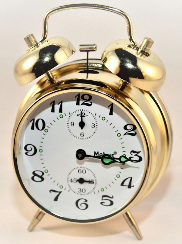 An alarm clock, representing a timer system like a Pomodoro